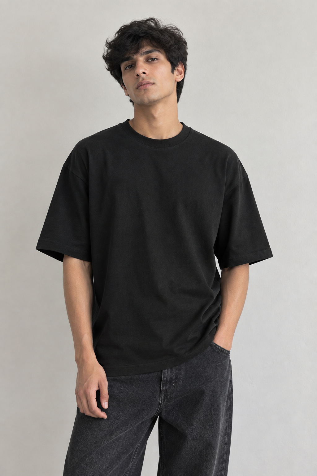 Known Clothing Essential black oversized t-shirt front view on male model