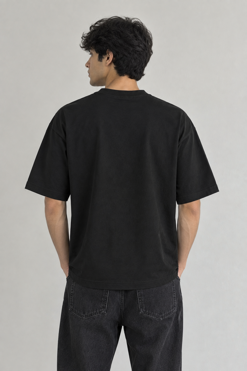 Known Clothing Essential black oversized t-shirt back view on male model