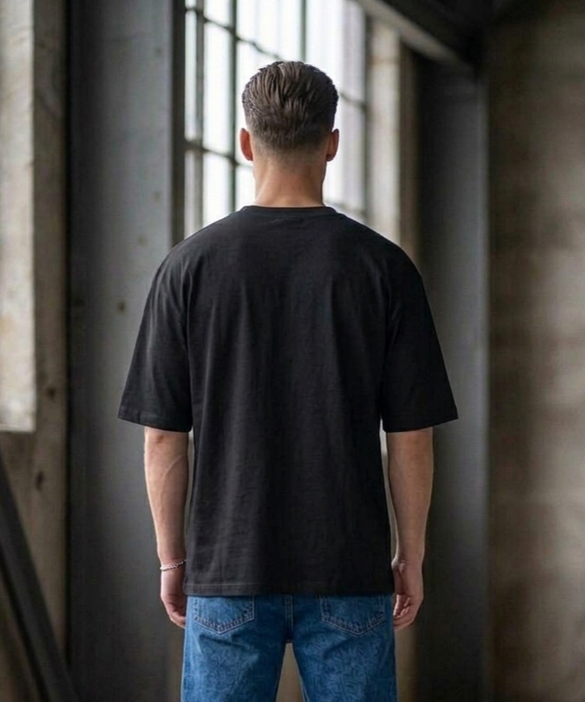 Known Clothing black stop loss graphic t-shirt back view on male model