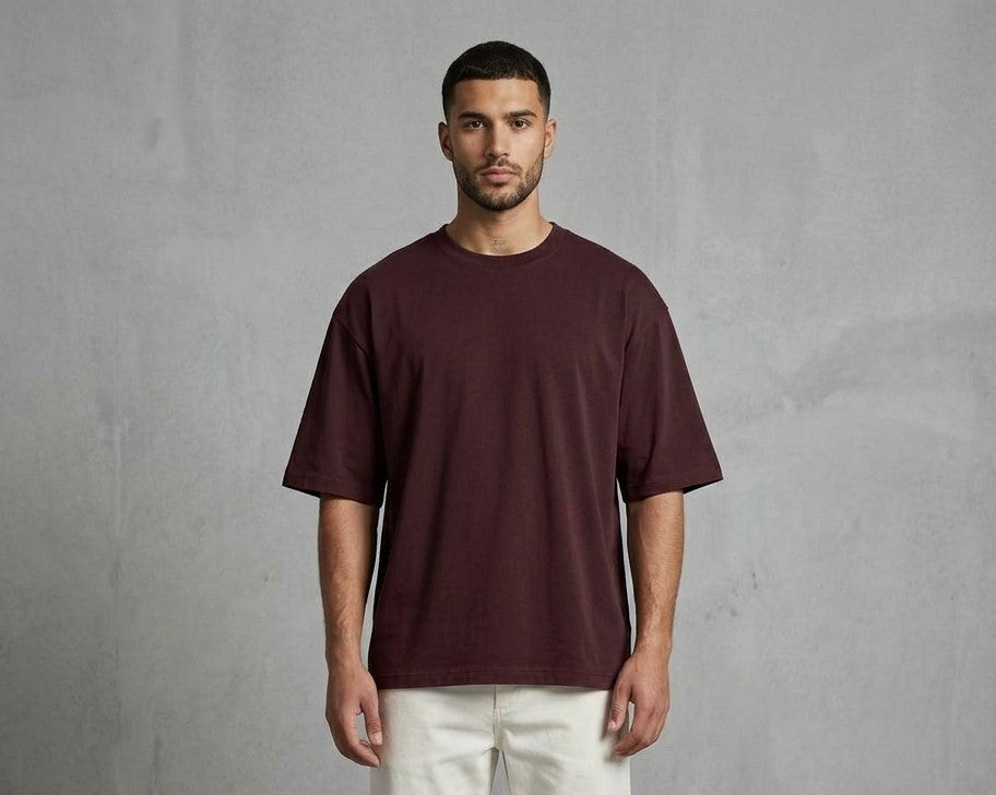 Known Clothing deep plum maroon oversized t-shirt front view on male model