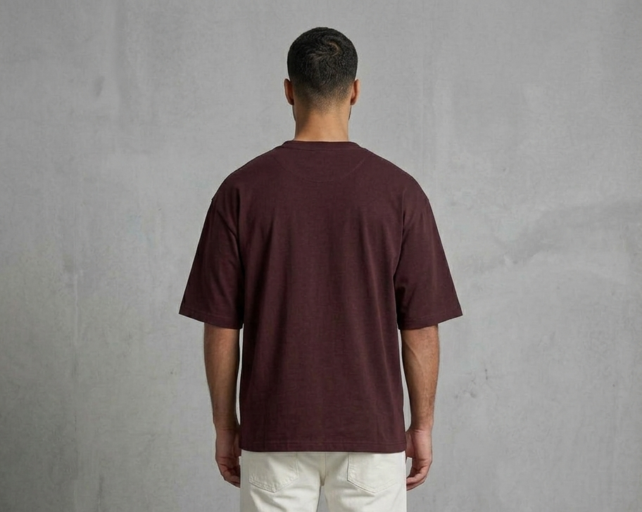 Known Clothing deep plum maroon oversized t-shirt back view on male model